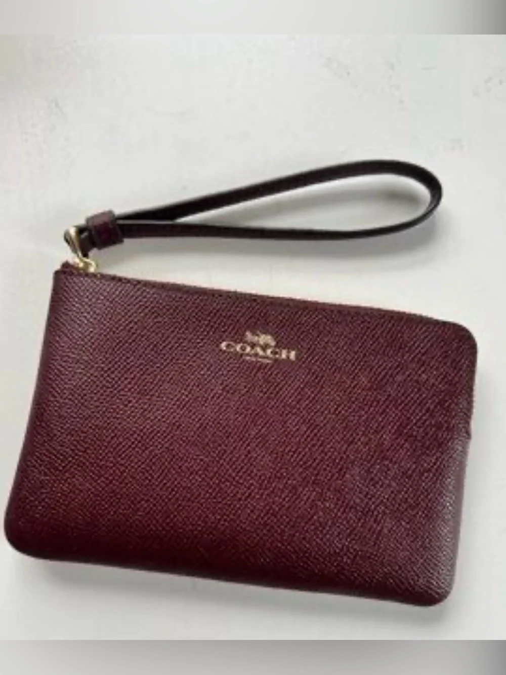 Coach Burgundy Leather Wristlet Clutch with Gold Logo